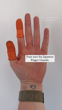 Video of a hand held up with an orange Japanese rubber finger guard on one finger, showing how the guards fit, then cvuts to a video of sanding, applying patine, and useing the flex shaft. With a text overlay about four uses for the Japanese Finger Guards